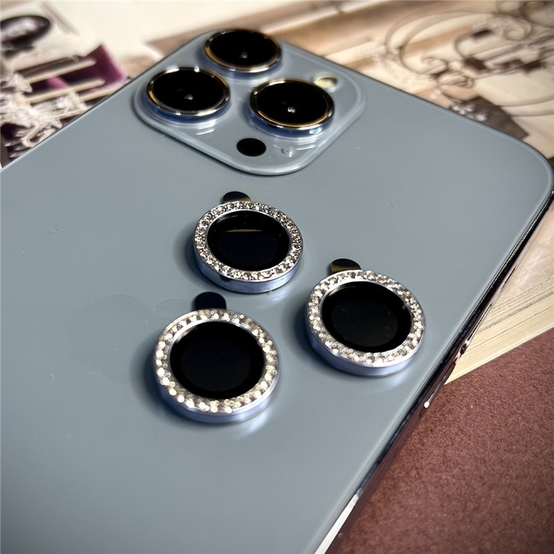 محافظ لنز دوربین ال کا جی مدل رینگی نگین دار مناسب برای گوشی موبایل اپل iPhone 15 Pro / 15 Pro Max